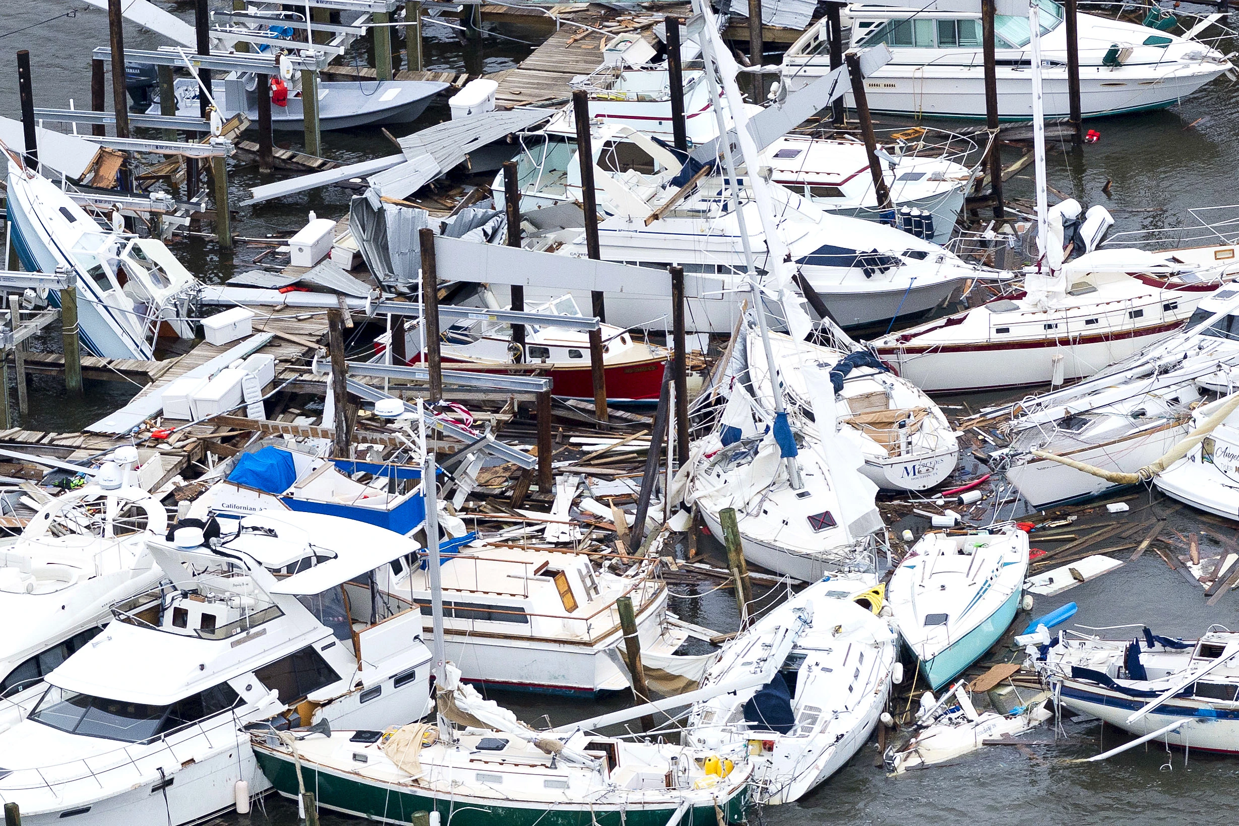Damaged boats in a marina